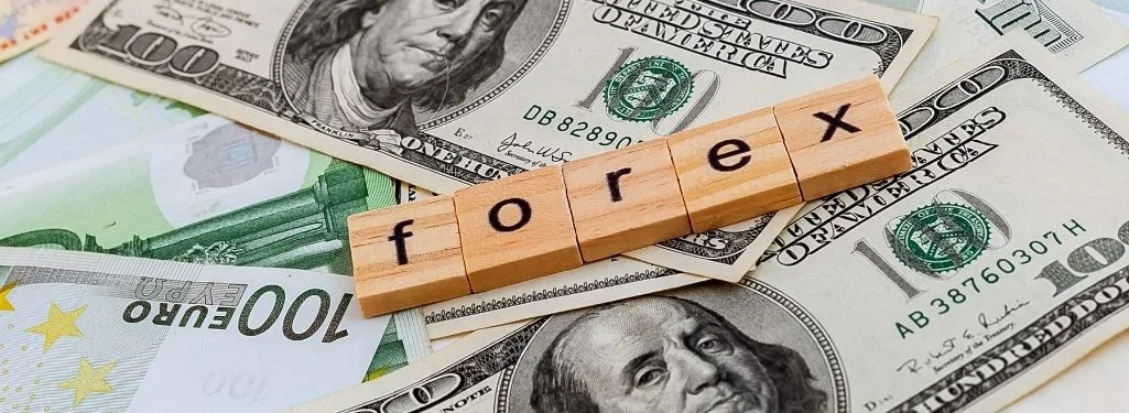 Forex letters on US Dollar and Euro bank notes