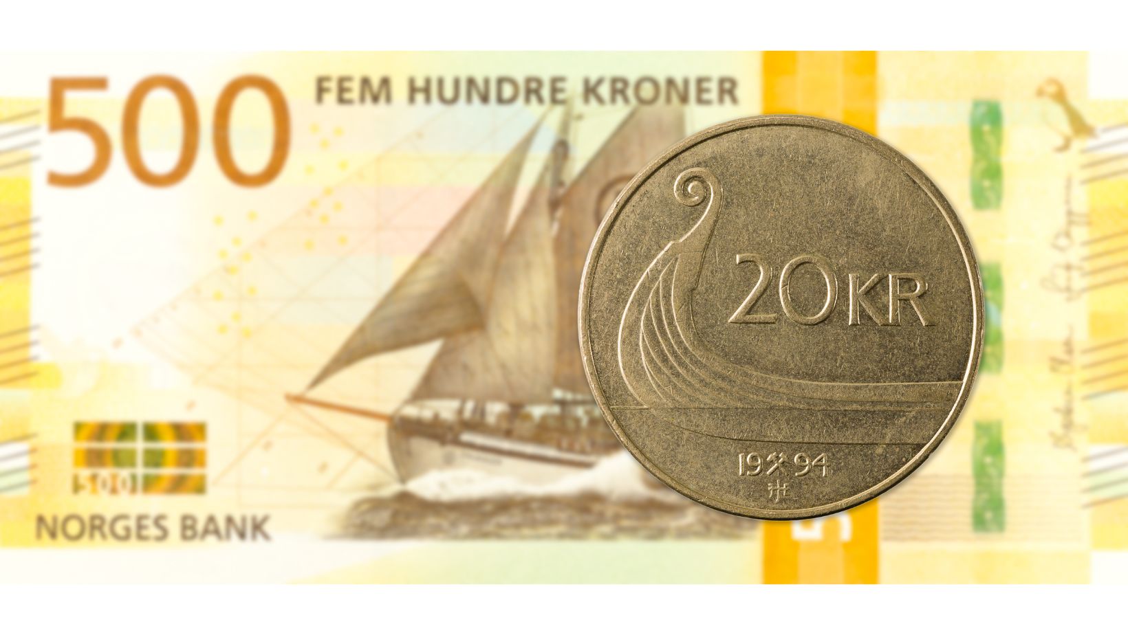 Bankovka 500 NOK a mince 20 NOK